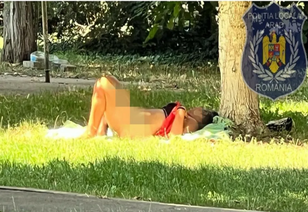 ȘOCANT! O femeie de 49 de ani s-a întins goală la soare, într-un parc din Arad. Oamenii au chemat poliția