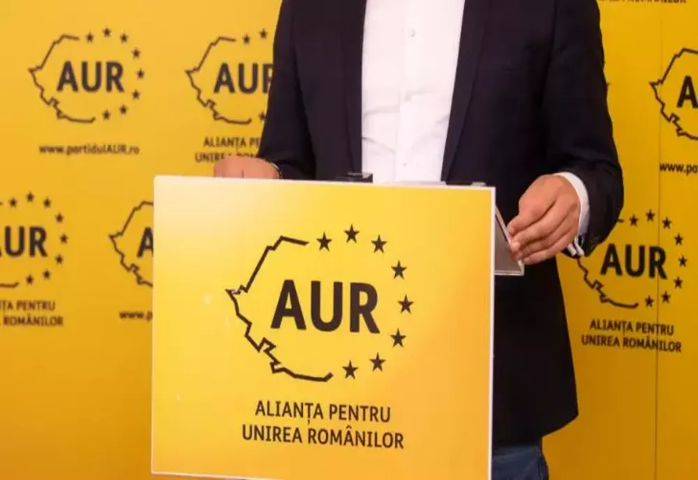 Un nou scandal în partidul lui Simion. Un membru AUR, prins în flagrant când primea mită. Denunțătorul este un coleg de partid