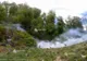 PĂDUREA DE LA BĂILE OLĂNEŞTI A LUAT FOC DIN NOU; ARDE FRUNZĂ USCATĂ PE UN HECTAR